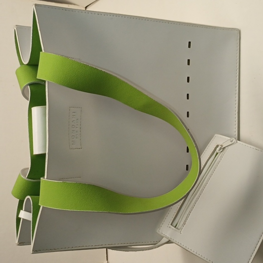 Mondani New York Leather Purse. It's white with a pretty lime green liner.